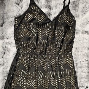 Black lace dress with tan under dress